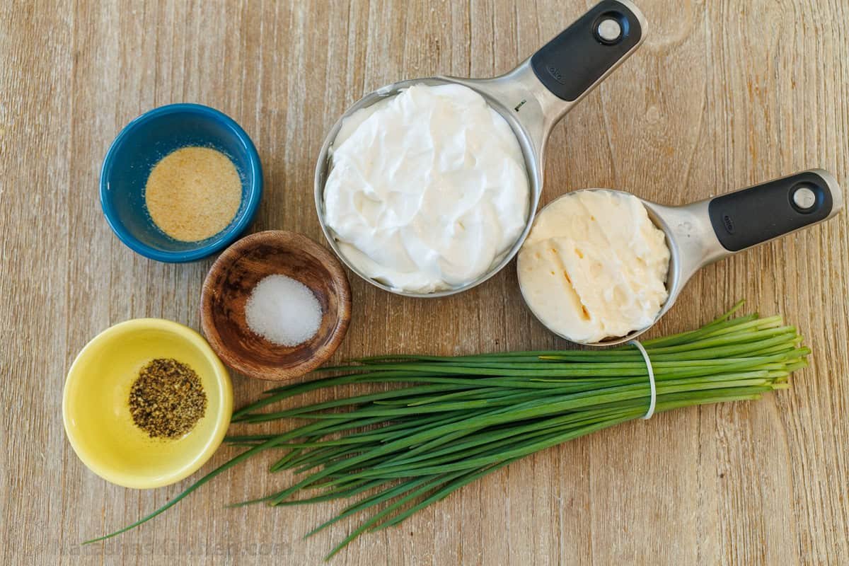 Easy Ranch Dip Recipe is ready in under 5 minutes with the best flavor and perfect thickness for dipping fresh vegetables and finger foods. Ingredients for easy homemade ranch dip including sour cream, mayo, chives, salt, pepper and garlic powder