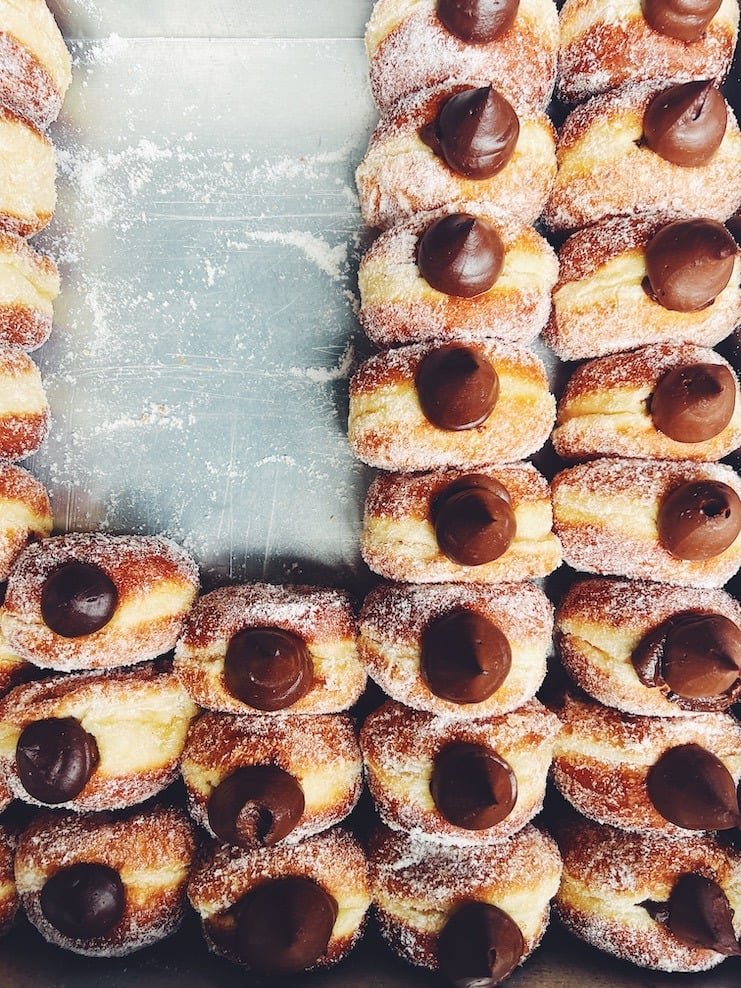 bread ahead chocolate donuts on metal sheet pan