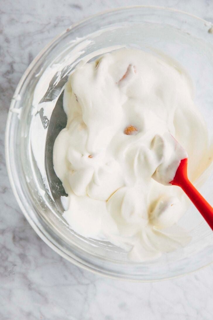 Photo showing the final texture of the small batch Magnolia Bakery banana pudding recipe, ensuring that the banana slices and wafers are covered