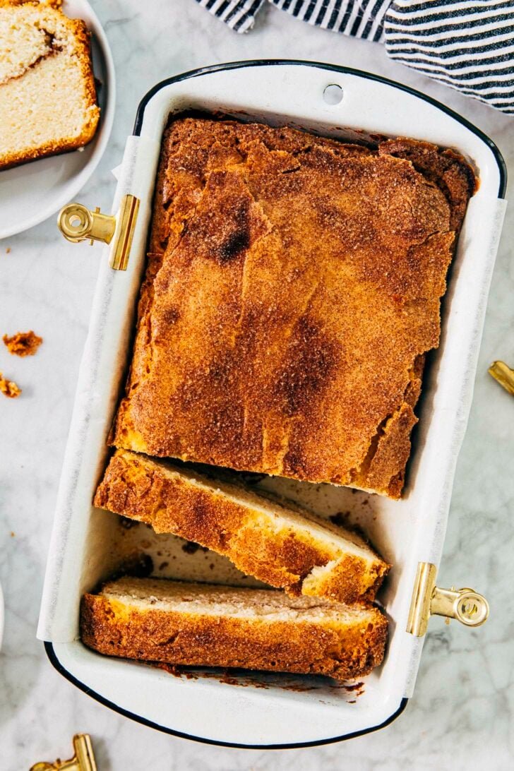 closeup photo of snickerdoodle bread sliced in the pan