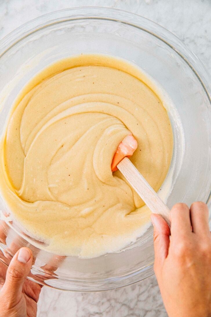 photo of snickerdoodle muffin batter in a bowl just after it's been mixed together