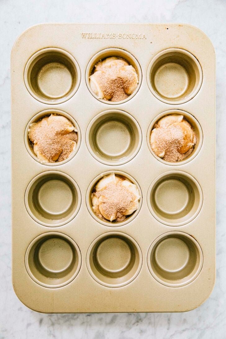 photo of the second muffin pan of batter showing the 'red cross' formation of the dough