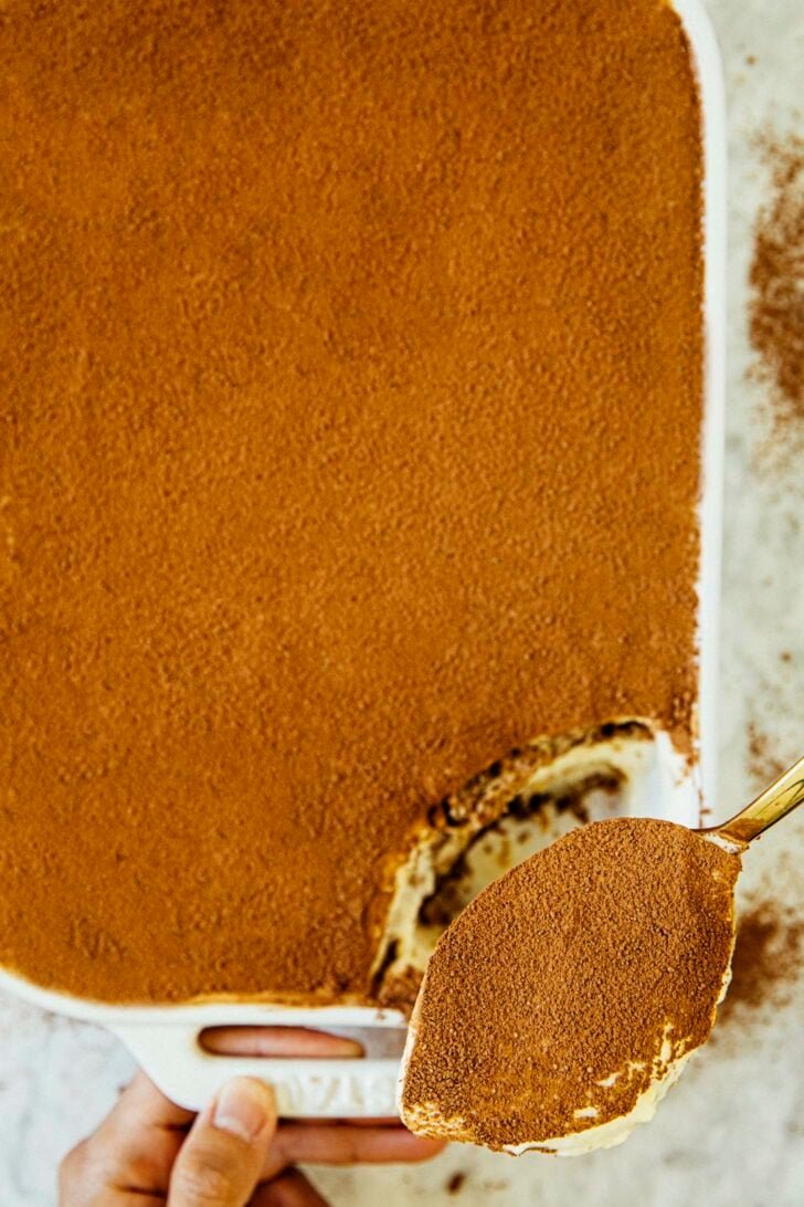 photo of tiramisu with a scoop removed