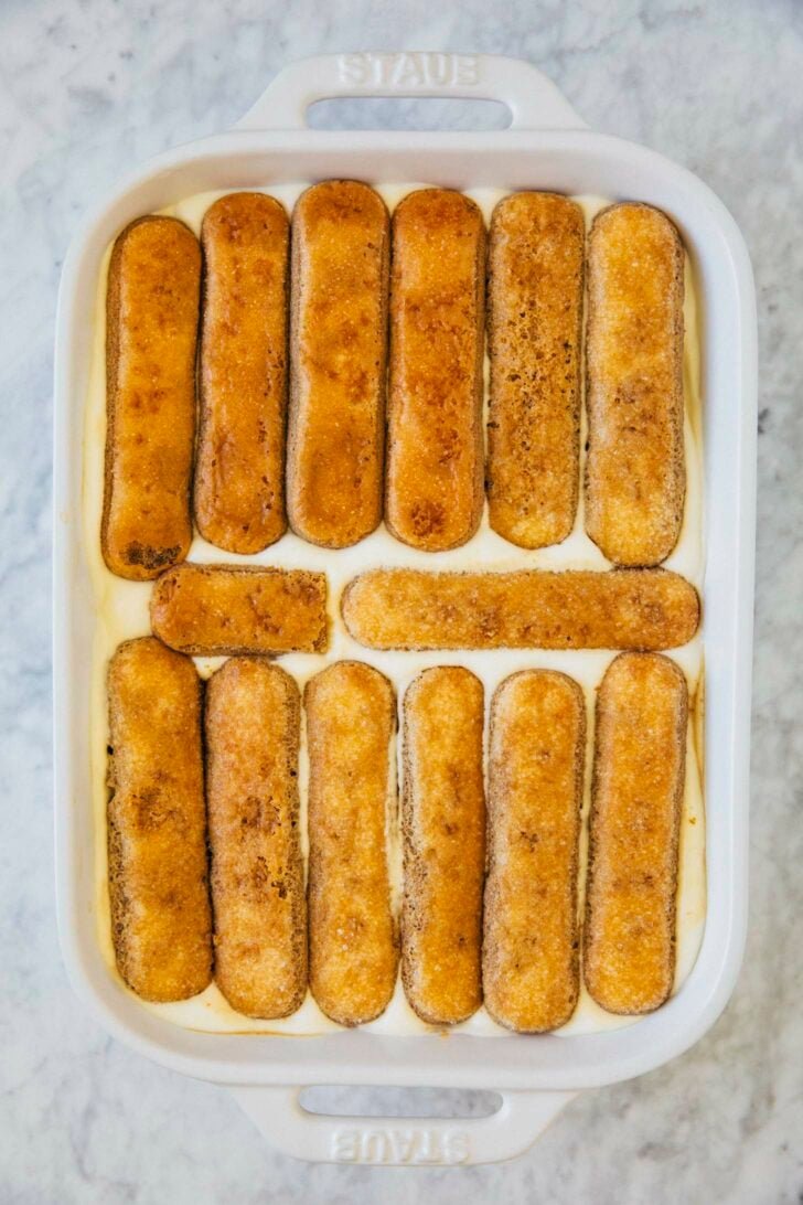 photo showing the second layer of soaked ladyfingers when making classic tiramisu