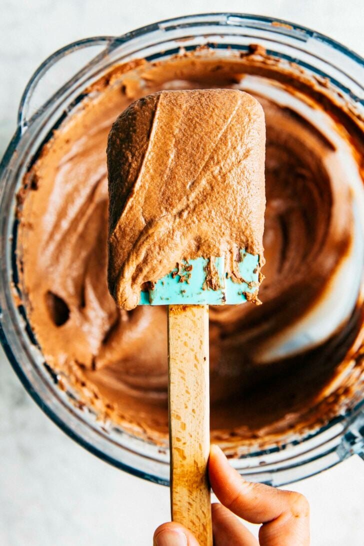 photo of a spatula covered in chocolate fudge frosting