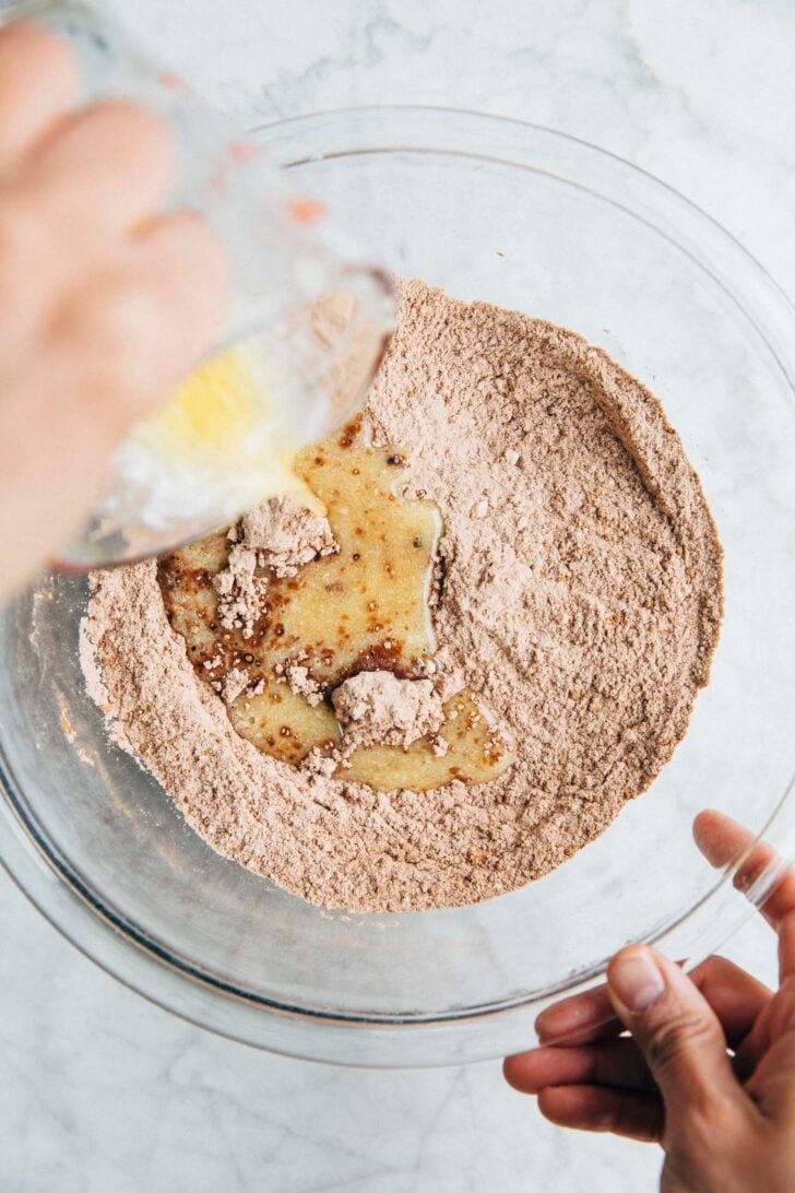 Photo showing the process of making the chocolate shortbread crust for the Dubai chocolate pistachio tart