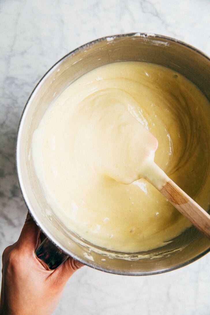 photo showing the texture of the banana pudding bundt cake batter right after it's been made, still in the mixer bowl