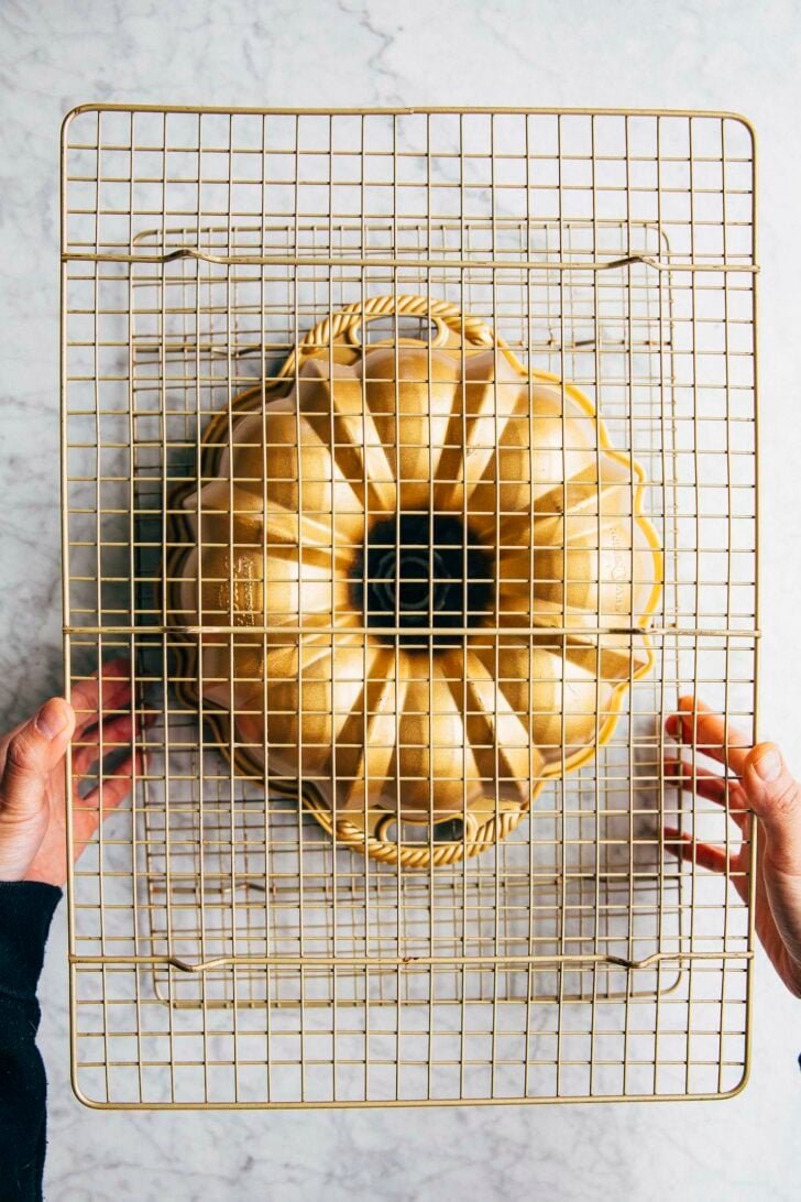 photo of michelle from hummingbird high flipping the banana pudding bundt cake