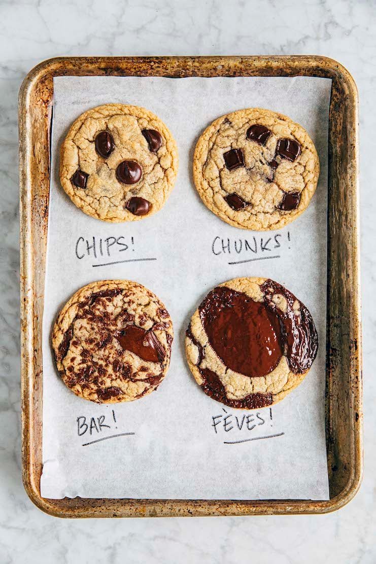 photo showing four chocolate chip cookies each with a different kind of chocolate