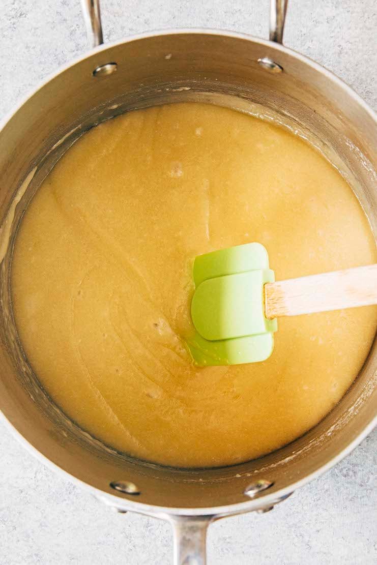photo showing the cake batter in the pan after the dry ingredients have been mixed in with no lumps in the batter