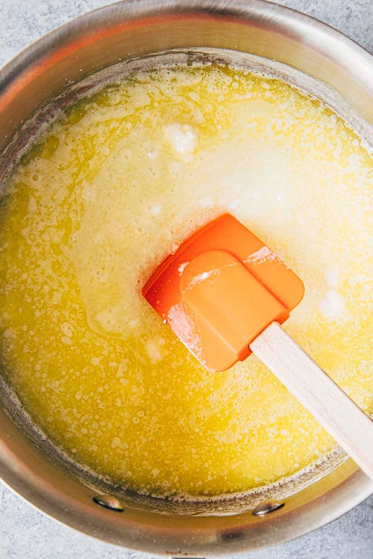 photo showing the frosting in the pan after all the ingredients have been added