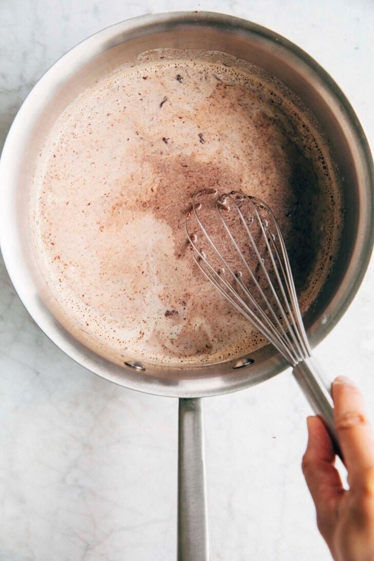 photo showing the first stage of making the hot chocolate and the texture of the milk right after the chocolate has been added