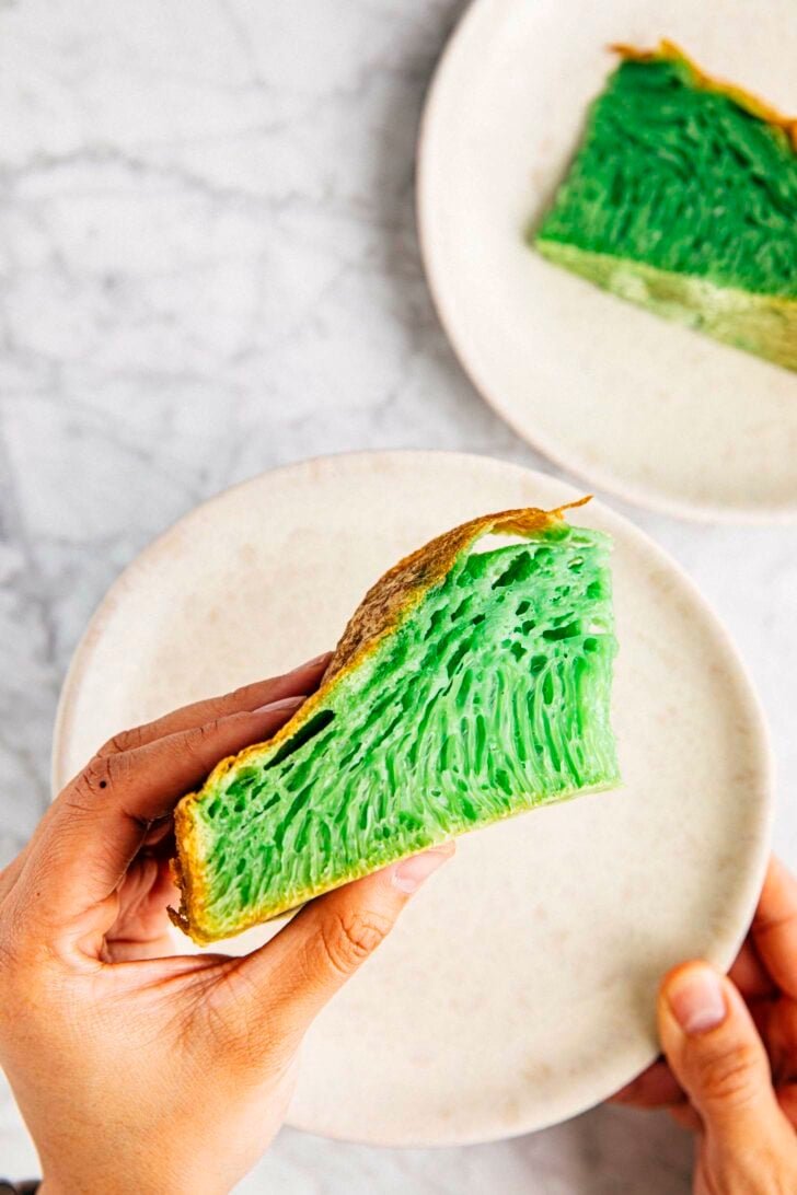 photo of michelle from hummingbird high holding a slice of vietnamese honeycomb cake over a beige plate