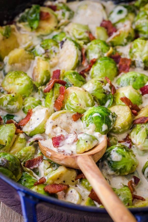 Brussels Sprouts in Alfredo Sauce with brussel sprouts in pan