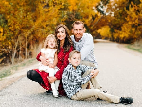 Natasha Kravchuk and family posing for photos