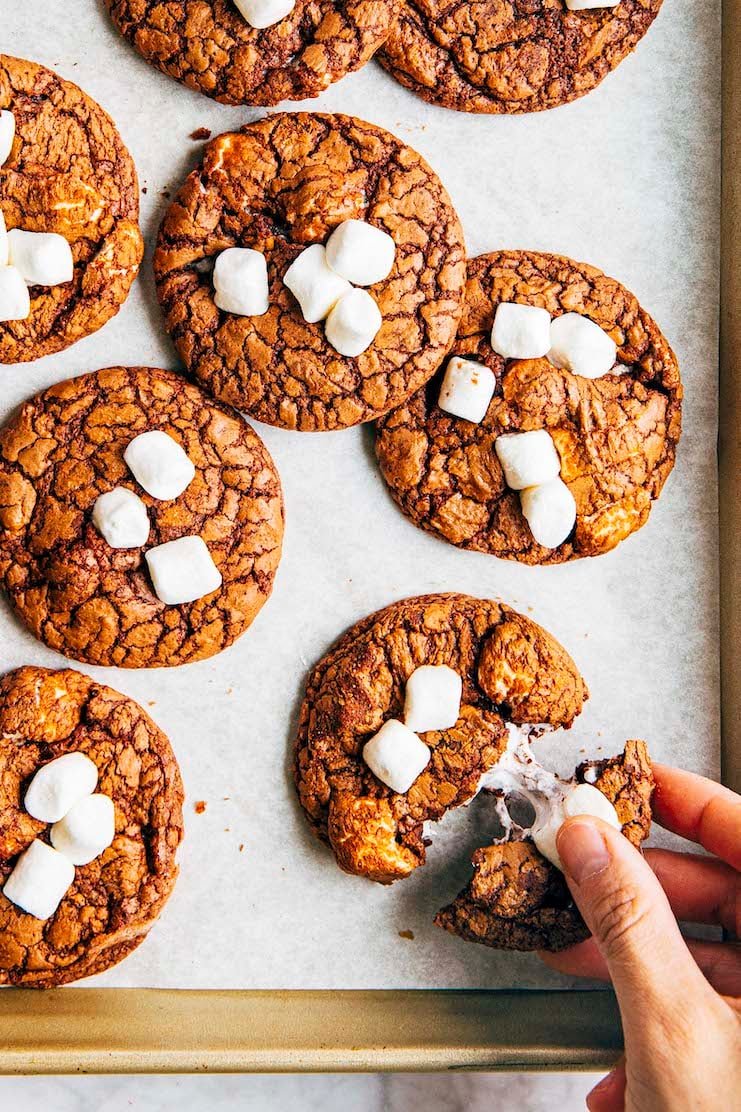 photo of hand pulling hot cocoa cookie open
