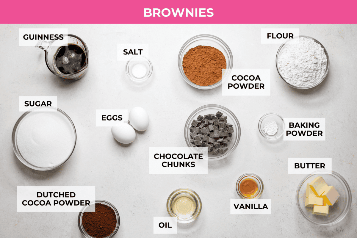 Rich, fudgy, and packed with deep chocolate flavor, Guinness Brownies are a must-try for any dessert lover! The stout beer enhances the cocoa, adding a subtle, malty depth of flavor that makes these brownies rich and irresistibly delicious. Overhead shot of labeled brownie ingredinets.