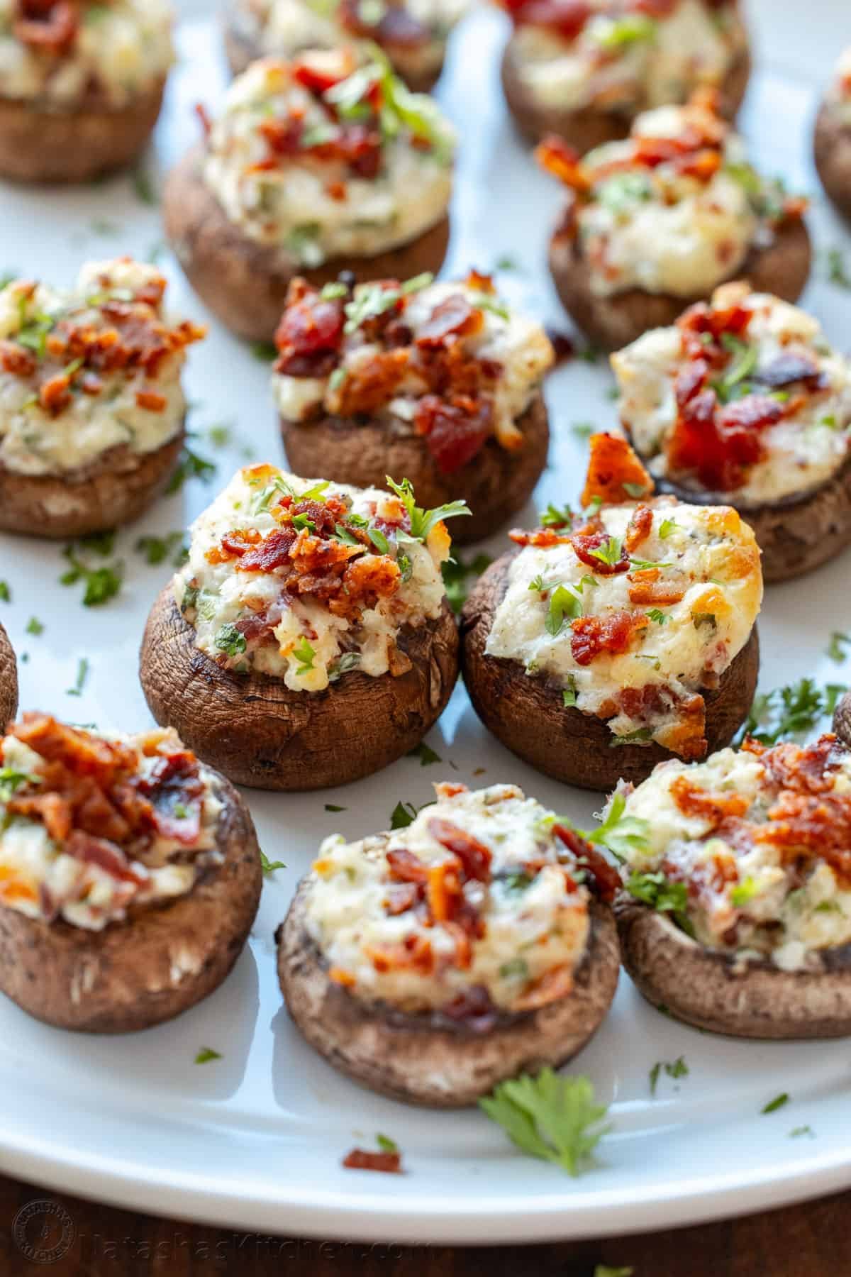 This is the best stuffed mushrooms recipe for your next party. The bite-sized appetizer is stuffed with cream cheese, bacon bites and garlic. Best stuffed Mushrooms recipe with bacon and cream cheese