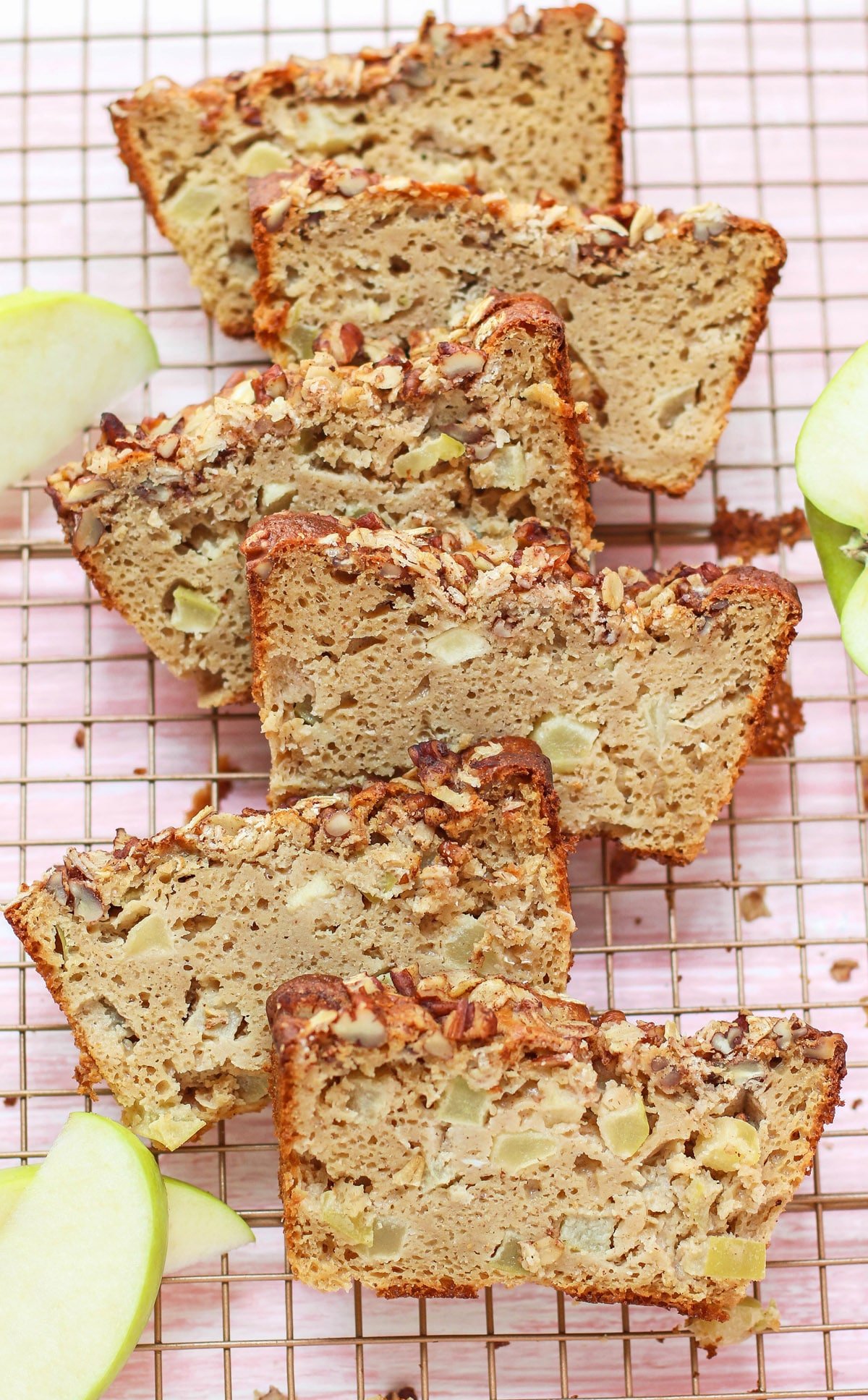 This healthy Apple Pie Bread is so fluffy, moist, and sweet, and it's topped with a deliciously spiced Oatmeal Streusel! It doesn't taste refined sugar free, low fat, high protein, or whole grain one bit! Only 160 calories and 5g fat, plus 6g protein and 3g fiber. Healthy Apple Pie Bread with Cinnamon-Sugar Oatmeal Streusel