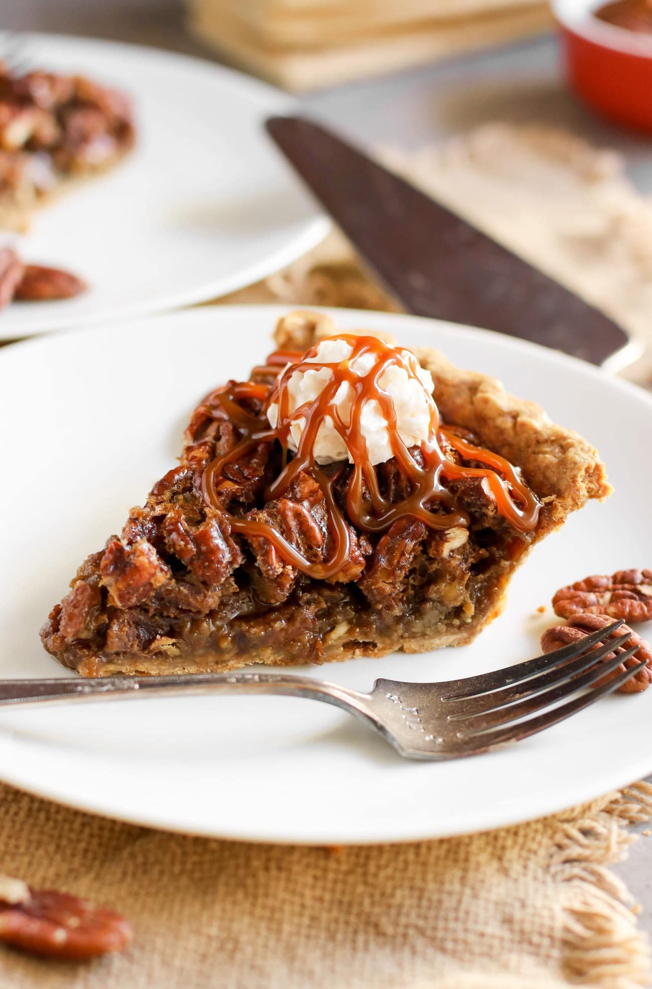 This Healthy Pecan Pie is so rich and decadent, every bite is pure joy -- you'd never know it's made without the corn syrup, white sugar, butter, and heavy cream! This freezer friendly Pecan Pie is an all natural, good-for-you dessert that is perfect for Thanksgiving, Christmas, birthdays, or any day for that matter!