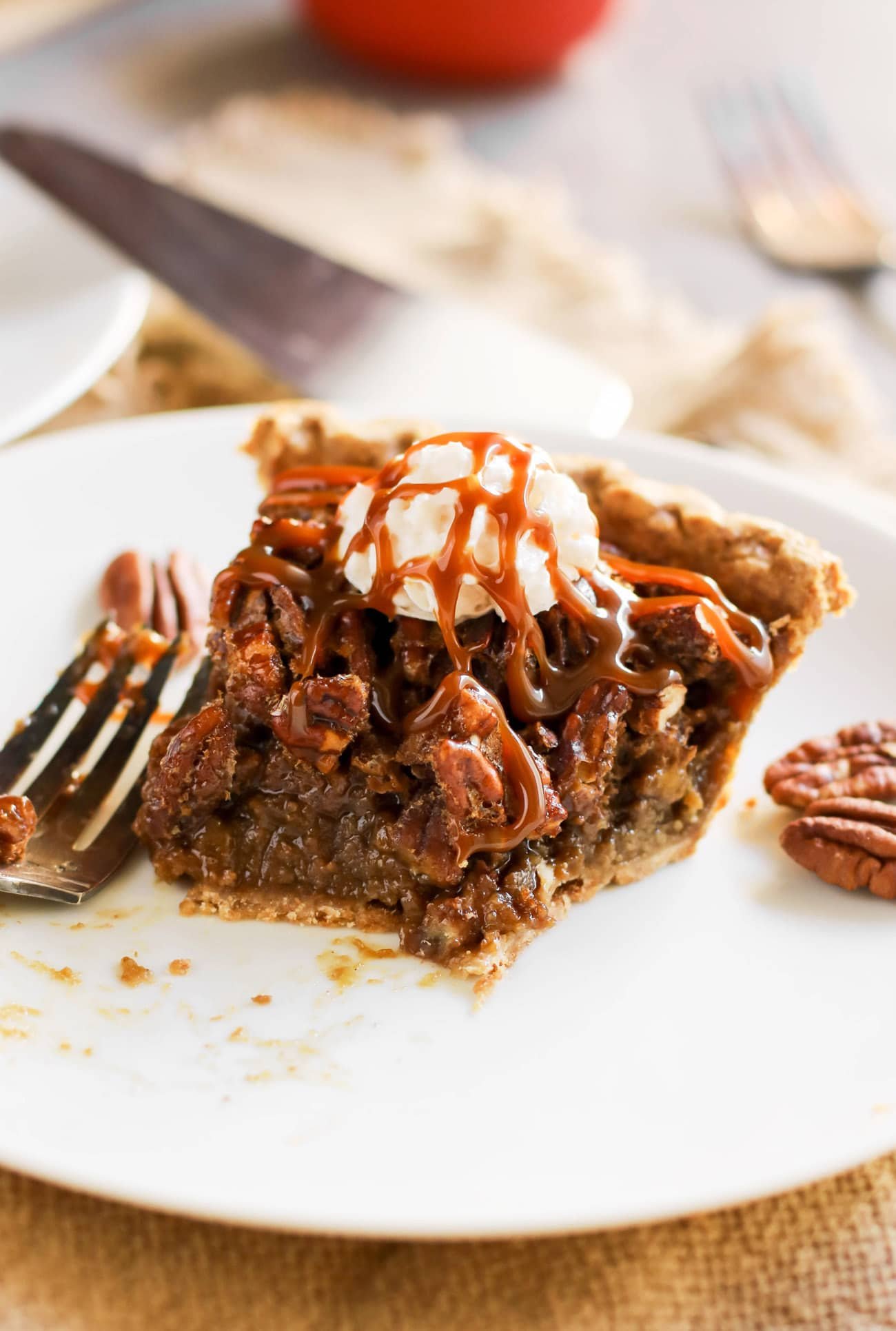 This Healthy Pecan Pie is so rich and decadent, every bite is pure joy -- you'd never know it's made without the corn syrup, white sugar, butter, and heavy cream! This freezer friendly Pecan Pie is an all natural, good-for-you dessert that is perfect for Thanksgiving, Christmas, birthdays, or any day for that matter!