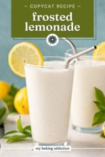 Close up of a glass of frosted lemonade on a marble countertop. Text overlay includes recipe name.