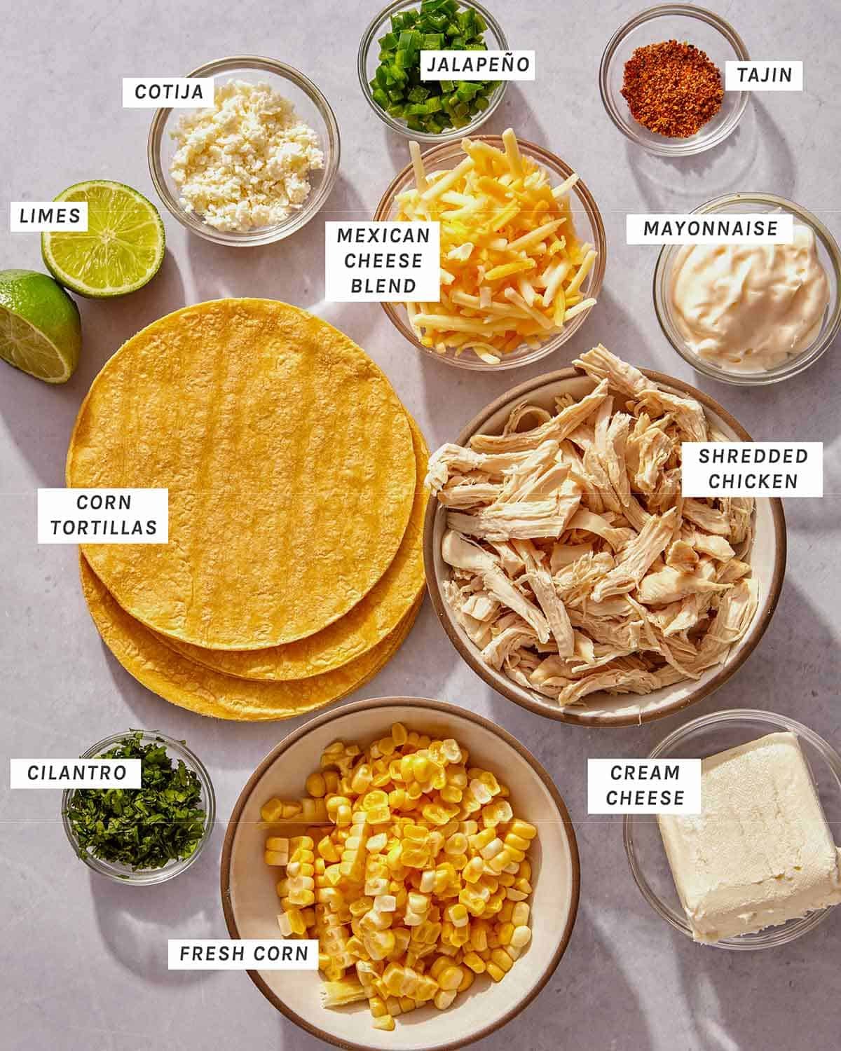 Homemade taquito ingredients all laid out on a kitchen counter.