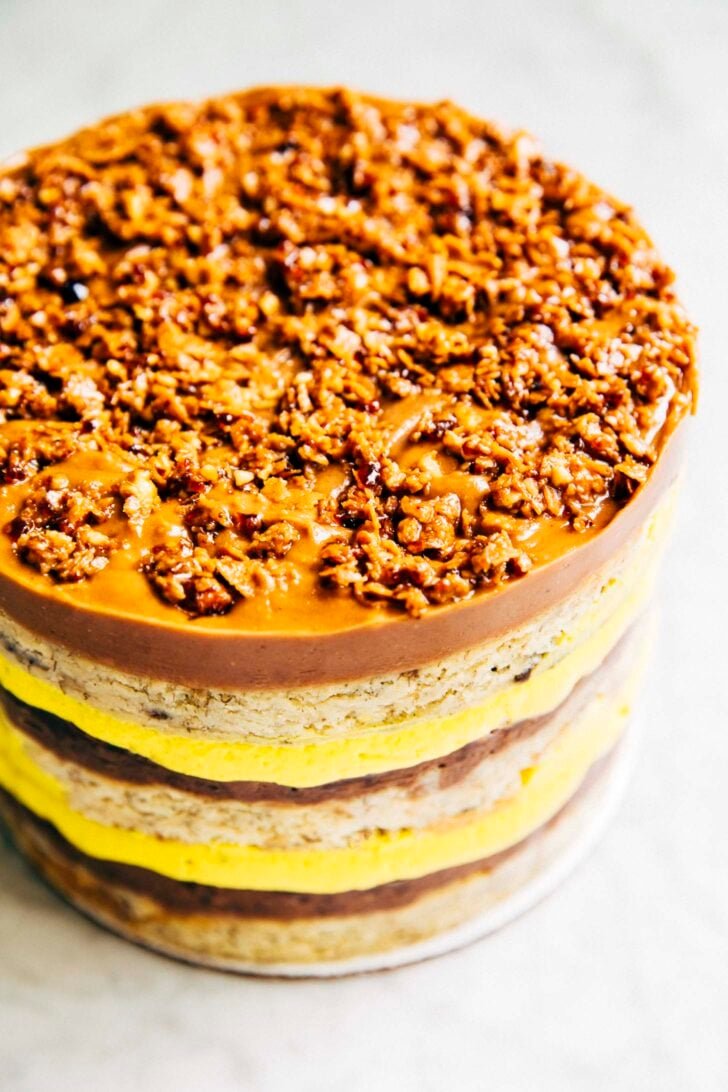 photo of milk bar banana layer cake showing the hazelnut frosting layer with hazelnut crunch