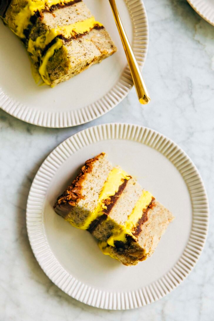 photo of milk bar banana cake slice on white cake plate