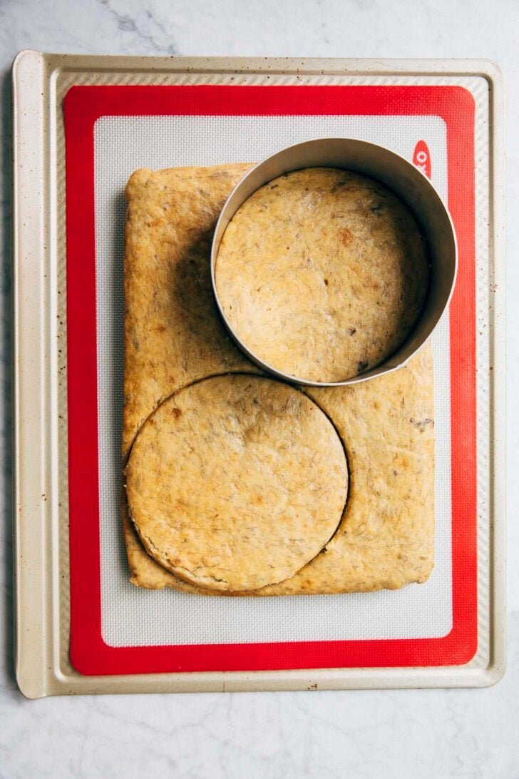 photo showing the cake ring stamping out the second layer from the banana sheet cake