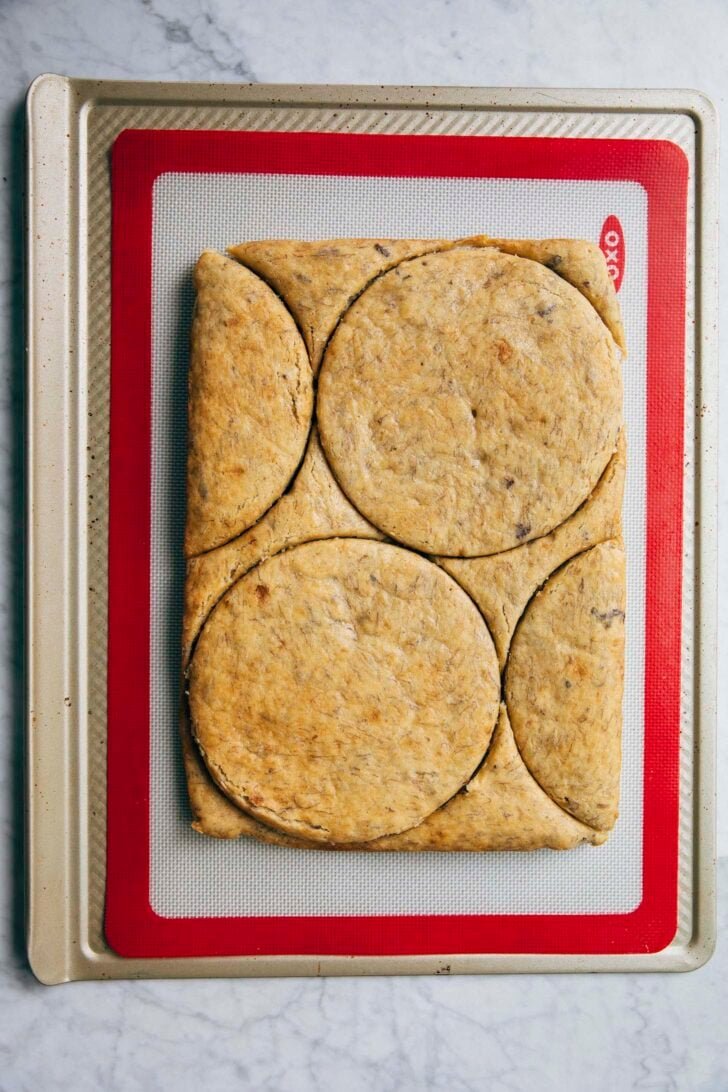 photo showing all the cake layers needed for the banana cake stamped out in the sheet cake