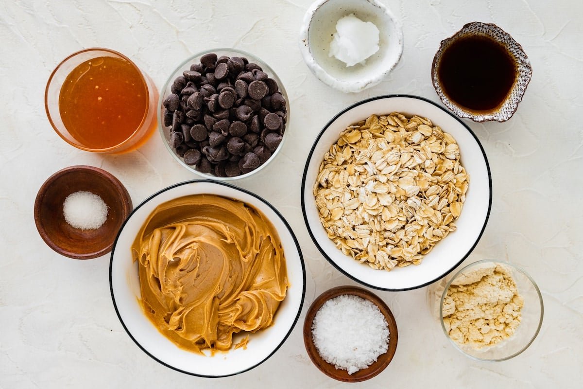 ingredients in bowls to make peanut butter protein balls.