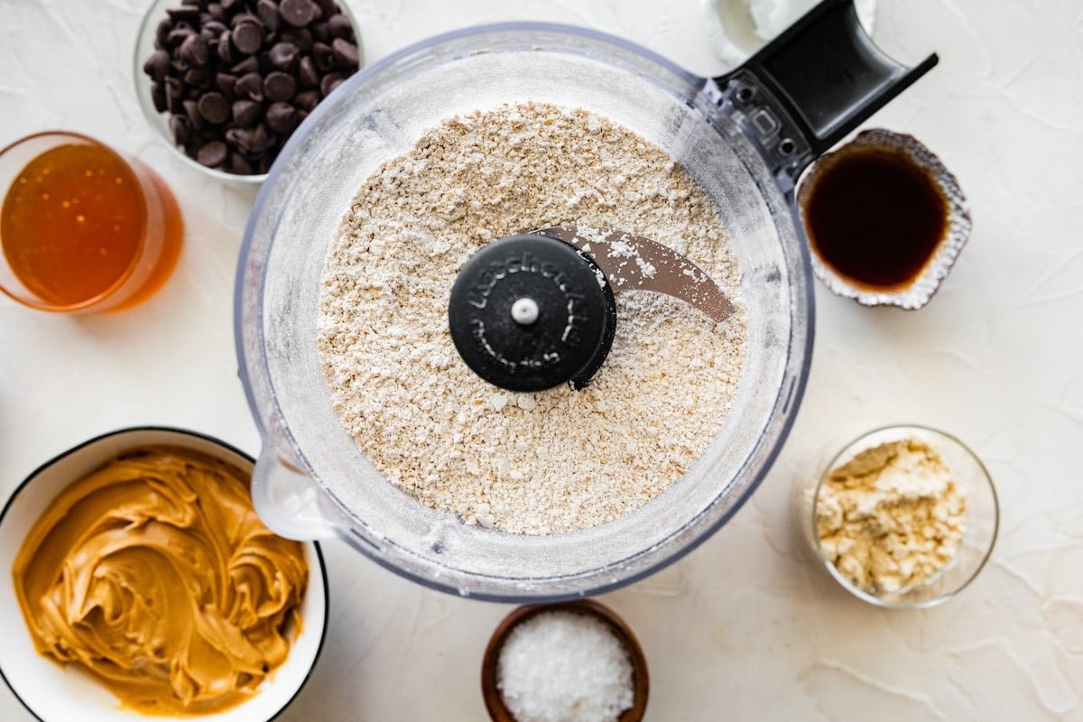 oats blended in food processor to make oat flour.