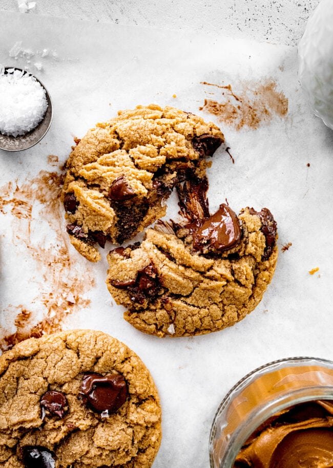 brown butter Biscoff chocolate chip cookie broken in half.