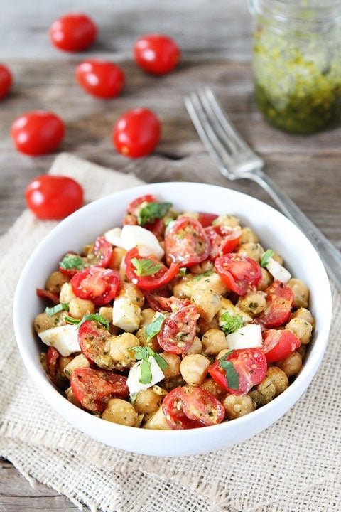 Chickpea, Pesto, Tomato, and Mozzarella Salad Recipe Chickpea, Pesto, Tomato, and Mozzarella Salad Recipe on twopeasandtheirpod.com Love this easy and healthy salad! #salad #summer