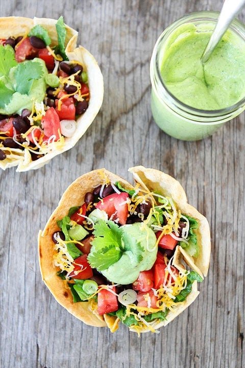 Taco Salad served in Homemade Tortilla Bowls! Recipe on twopeasandtheirpod.com Taco Salad served in Homemade Tortilla Bowls! Recipe on twopeasandtheirpod.com