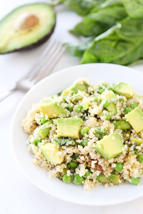 Quinoa Salad with Asparagus, Peas, Avocado & Lemon Basil Dressing on www.twopeasandtheirpod.com Fresh and easy spring salad! Spring-Quinoa-Salad-11