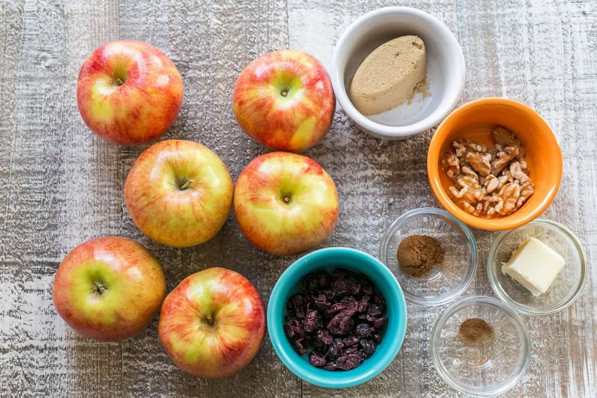 These cozy Baked Apples are infused with fall flavor inside and out. Stuffed with cinnamon sugar, they taste just like apple pie filling! The ingredients for baked apples.