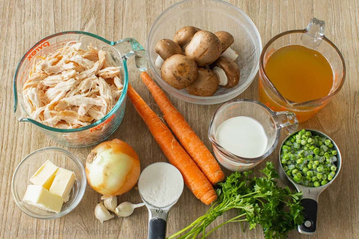 Chicken Pot Pie Casserole has all the cozy flavor of a creamy chicken pot pie, topped with flaky biscuits instead of baked inside a pie crust. The ingredients for chicken pot pie caasserole.