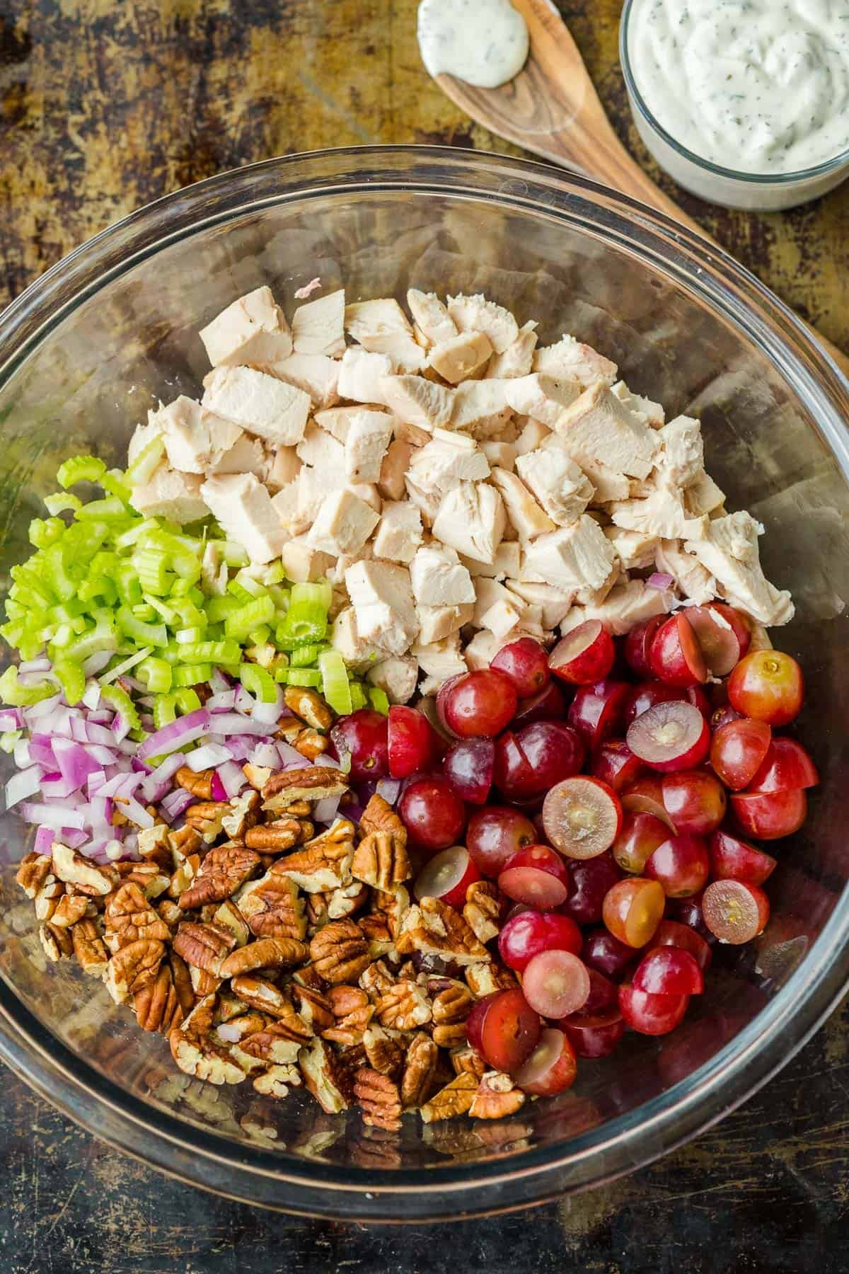 Easy Chicken Salad with chicken, grapes, pecans, and the best creamy dressing. A fresher and lightened-up version of classic chicken salad. Making chicken salad in a bowl