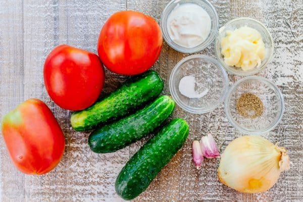 This CLASSIC creamy cucumber and tomato salad is so simple to make and is our go-to summer salad. An easy, excellent cucumber tomato salad. KEEPER! | natashaskitchen.com