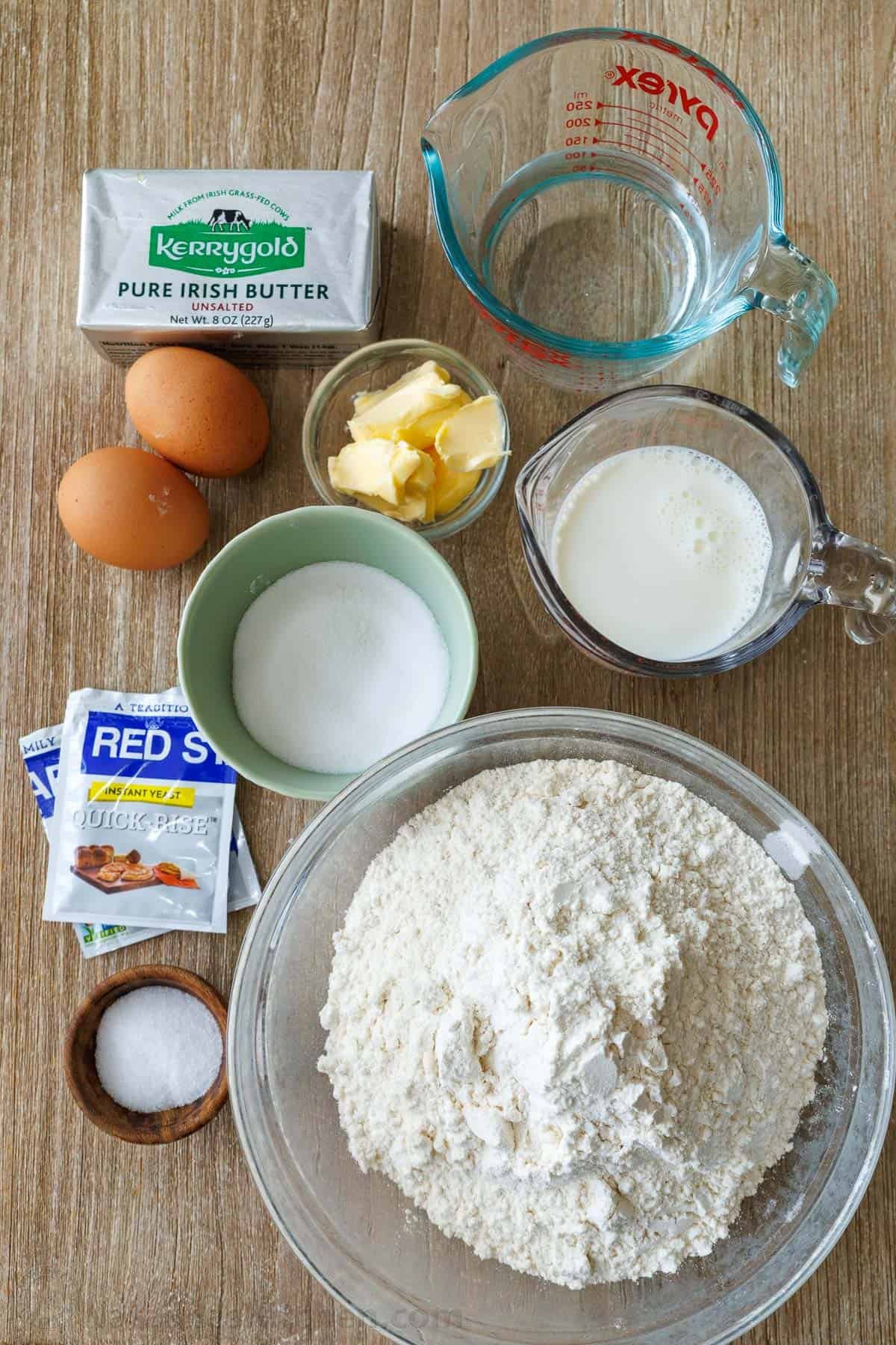 Ingredients to make homemade Croissants: butter, eggs, instant yeast, cold water, milk, butter, salt, sugar, and flour Ingredients to make homemade Croissants: butter, eggs, instant yeast, cold water, milk, butter, salt, sugar, and flour