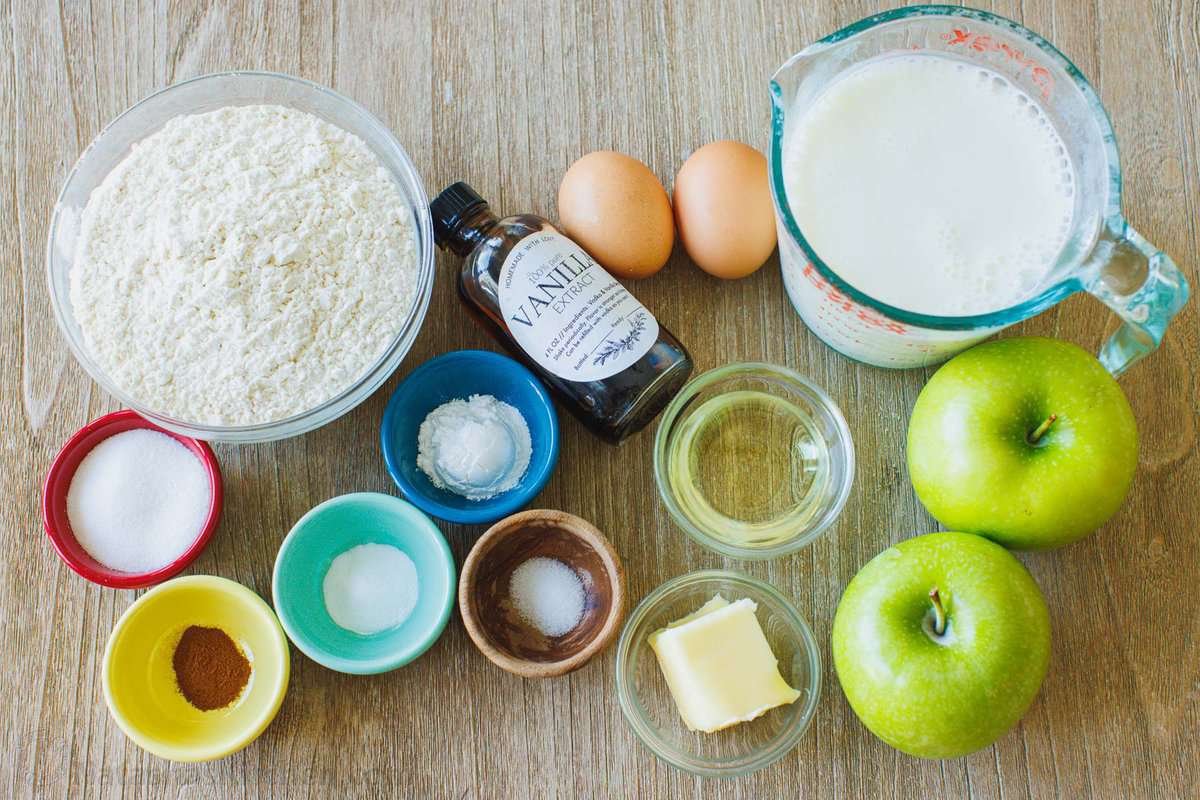 The ingredients for homemade apple pancakes with cinnamon.