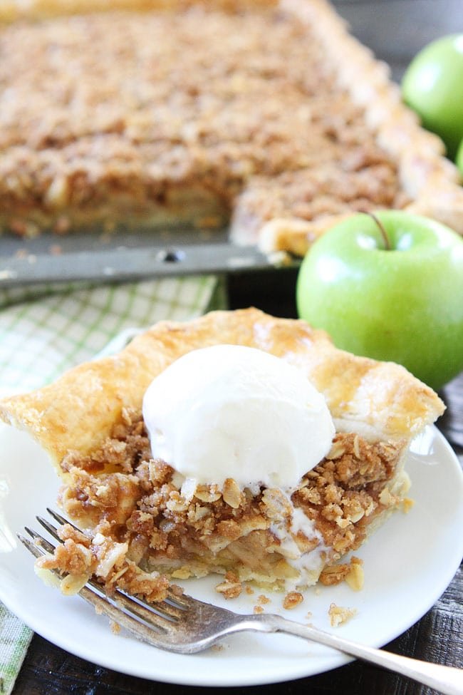 Apple Slab Pie with Crumb Topping Recipe on twopeasandtheirpod.com This easy apple pie is made in a jelly roll pan and is perfect for feeding a crowd! Apple Slab Pie with Crumb Topping Recipe
