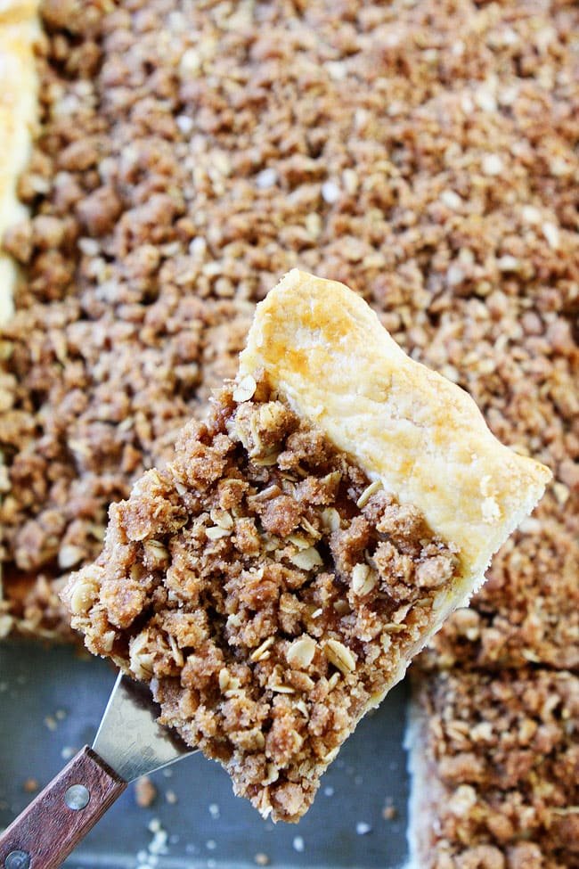 Apple Slab Pie with Crumb Topping Recipe on twopeasandtheirpod.com This easy apple pie is made in a jelly roll pan and is perfect for feeding a crowd. It is our family's favorite dessert. Apple Slab Pie with Crumb Topping Recipe