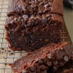 Sliced Chocolate Banana Bread on a wire rack, showcasing the chocolate chocolate chips