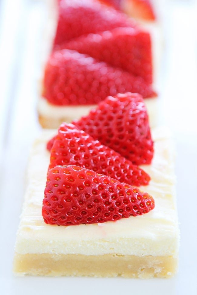 Strawberries and Cream Bars Recipe on twopeasandtheirpod.com These easy dessert bars are perfect for spring and summer! Everyone loves them! Strawberries and Cream Bars Recipe