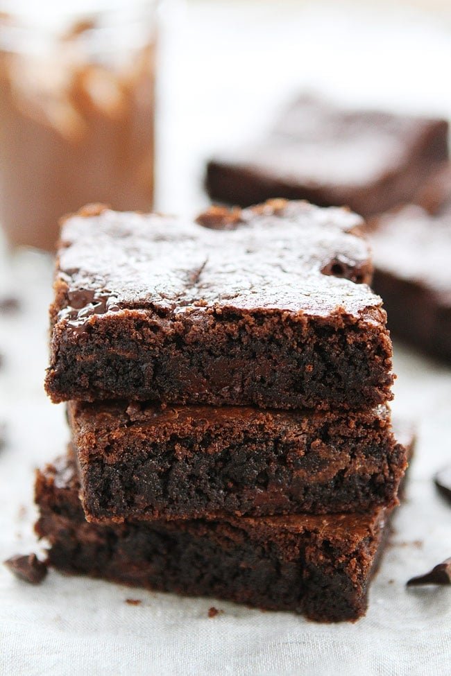 Chocolate Nutella Cookie Bars with Sea Salt Recipe on twopeasandtheirpod.com These rich and fudgy cookie bars are loaded with chocolate chunks, Nutella, and sprinkled with sea salt. Chocolate lovers will go crazy for these bars! Chocolate Nutella Cookie Bars with Sea Salt Recipe
