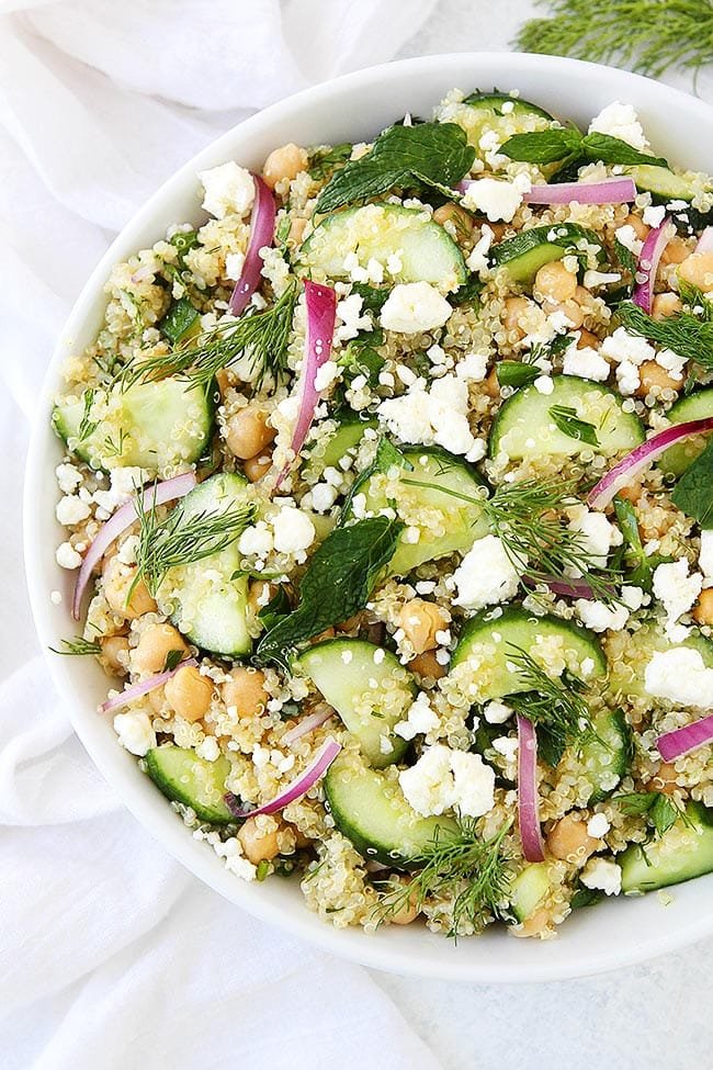 This simple and fresh Cucumber Quinoa Salad is the perfect side dish to any meal. It is gluten-free, vegetarian, and so good! #salad #quinoa #chickpeas #glutenfree #vegetarian #cucumber #summer #easyrecipe #healthyrecipe Cucumber Quinoa Salad Recipe