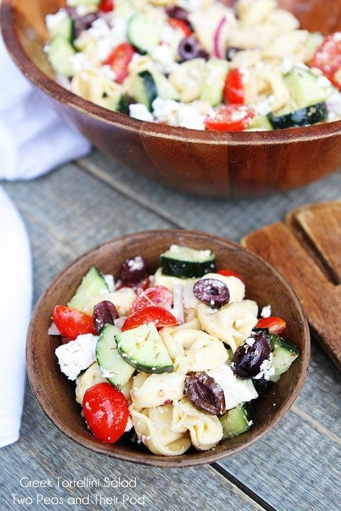 Greek Tortellini Salad Recipe on twopeasandtheirpod.com My favorite pasta salad! Greek Tortellini Salad served in wooden bowl